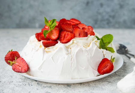 Pavlova cake with cream and strawberries, selective focusの写真素材