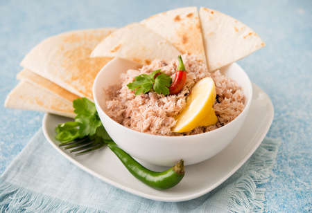 Mas Huni. Traditional Maldivian breakfast of tuna, coconut, onion and chili with chapati tortillas. Close upの写真素材