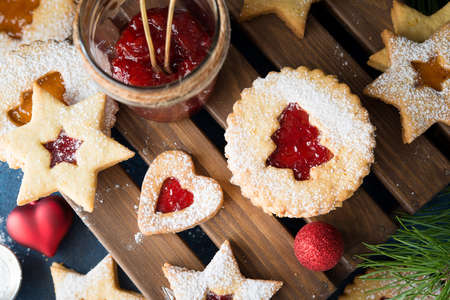 Christmas cookies with jam. A popular Austrian cookie is Linz cookies. Selective focus. Top view