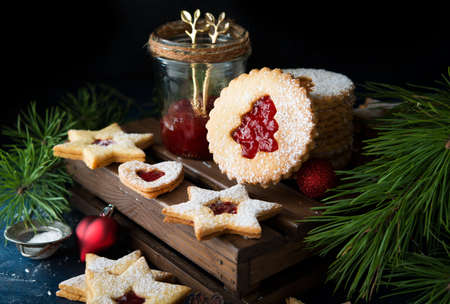 Christmas cookies with jam. A popular Austrian cookie is Linz cookies. Selective focus.の写真素材