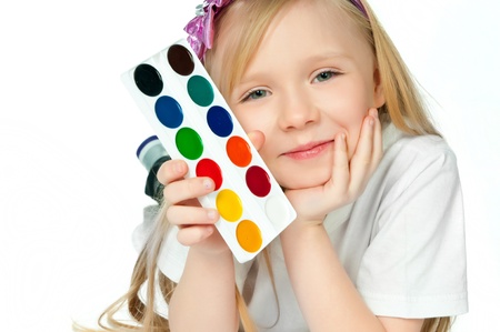 cute little girl with paintsの写真素材