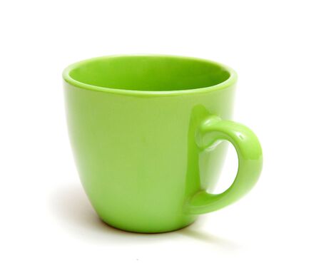 green mug isolated on a white backgroundの写真素材