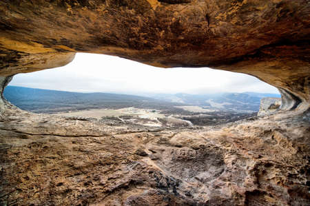 Beautiful landscape view from a cave in the rockの写真素材