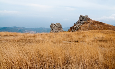 Nice view of the series of mountains with cloudsの写真素材