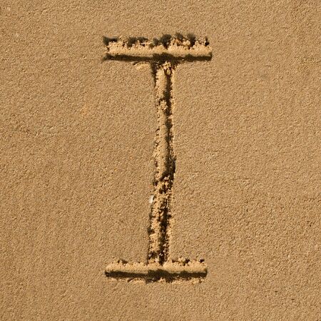 English alphabet in the sandの写真素材