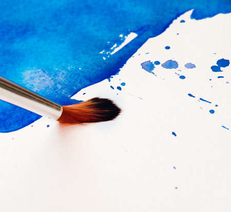 Brush on a colorful backgroundの写真素材