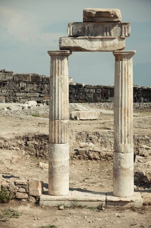 ruins of the ancient columns and archの写真素材