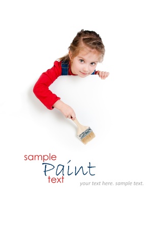 Pretty little girl with a brush and white bannerの写真素材