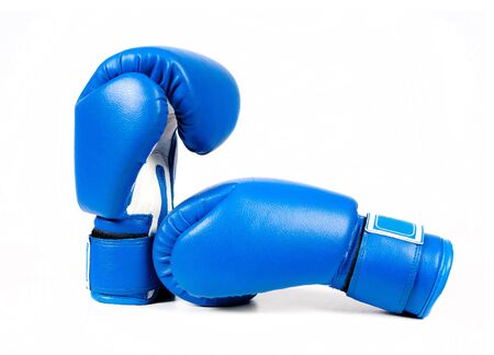 Blue boxing gloves isolated on white backgroundの写真素材