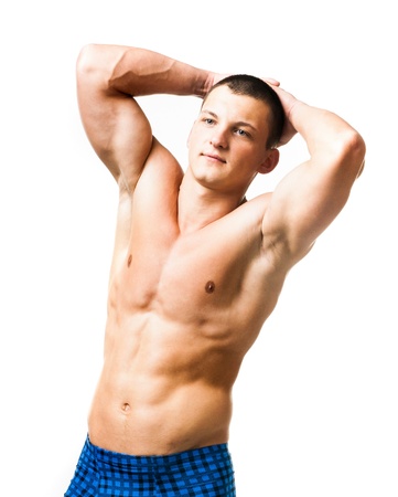 strong athletic man torso on white backgroundの写真素材