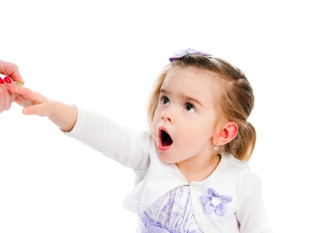 cute little girl holding the handの写真素材