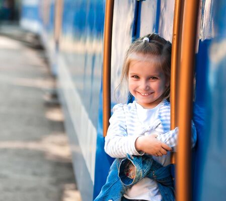 Cute little girl with trainの写真素材