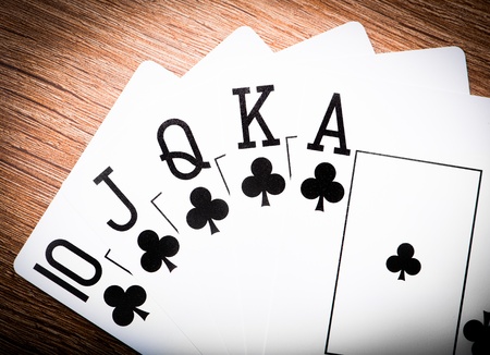 Royal flash on red poker table