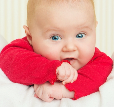 bright closeup portrait of cute adorable babyの写真素材