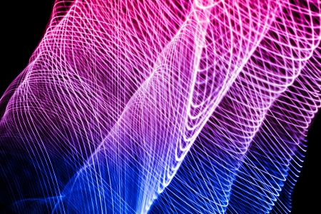 Abstract light background in violet blue colors on a dark backgroundの写真素材