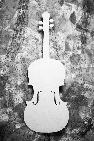 white cello on a grey grunge backgroundの写真素材
