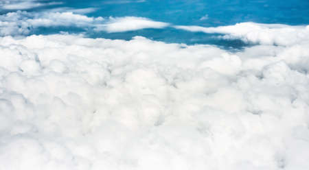 blue sky background with white cloudsの写真素材