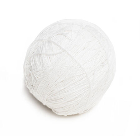 ball of white yarn for knitting isolated on a white backgroundの写真素材
