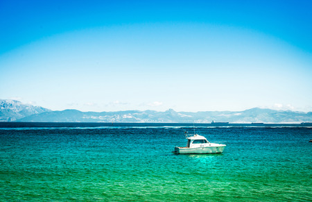 Yacht on azure sea water in Tarifa, Spainの写真素材