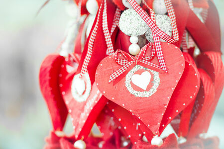 beautiful wooden hearts on stringsの写真素材