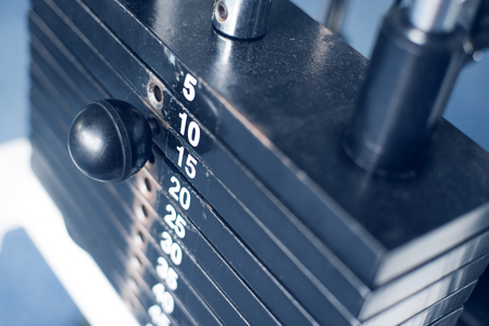 Stack of  metal weights in gym bodybuilding equipmentの写真素材