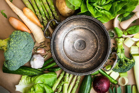 Fresh vegetables and old metal bowl