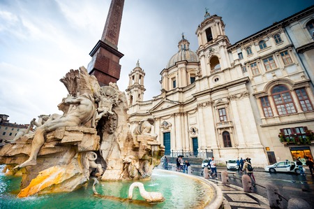 Rome, Italy - November 17, 2014: Tourists visit Piazza Navona with fountain  in Rome, Italy. Rome is of the most visited city in Europe and worldのeditorial素材