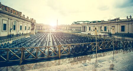 seats on Saint Peter Square near Saint Peter Basilica, Vatican City, Rome, Italyの写真素材
