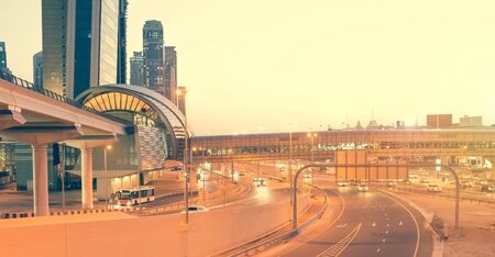 Skyscraper roads and bridge at the Sheikh Zayed Road in Dubai in the evening, United Arab Emiratesの写真素材