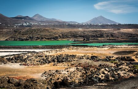 beautiful mountain landscape with a lake on the island of Lanzarote, Canary Islandsの写真素材