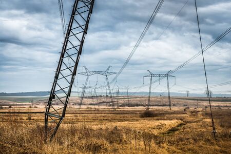 scenic landscape of fields with power transmission lines