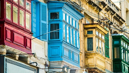 traditional balconies in historical center of Valletta in Maltaの写真素材