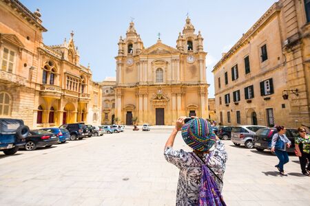 Mdina, Malta - 26 May, 2015: St. Paul's Cathedra on the background of Rabat squarel in the city of Mdina (The city of Silence) in Maltaのeditorial素材