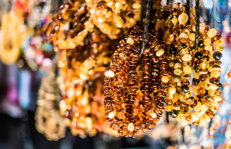 amber bracelets on market of antiquesの写真素材