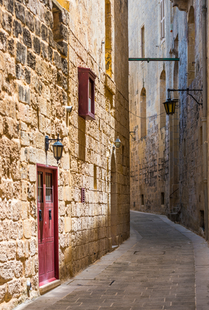 traditional narrow silent street in Maltese Mdinaの写真素材