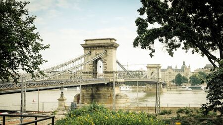 Szechenyi (Chain) bridge crossing Danube in Budapest, Hungaryの写真素材