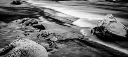 beautiful landscape with mountain clear river and stonesの写真素材