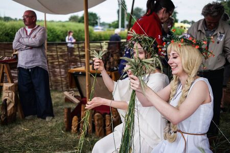 Warsaw, Poland - 8 March 2015:  girls with herbal wreaths on midsummer holidayのeditorial素材