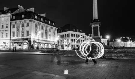 Warsaw, Poland - June 25, 2015: fire show in evening on a Warsaw square, Polandのeditorial素材