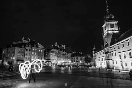 Warsaw, Poland - June 25, 2015: fire show in evening on a Warsaw square, Polandのeditorial素材