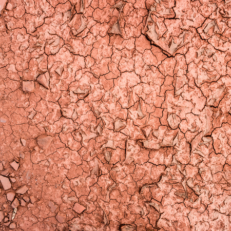 red cracked ground in iron ore textureの写真素材
