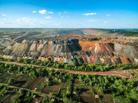 beautiful landscape with multicolored rock dumps from quarries, aerial photoの写真素材