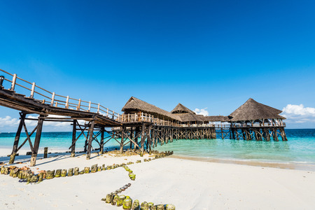 colorful landscape with african hotel in sea on the pier, Zanzibarの写真素材