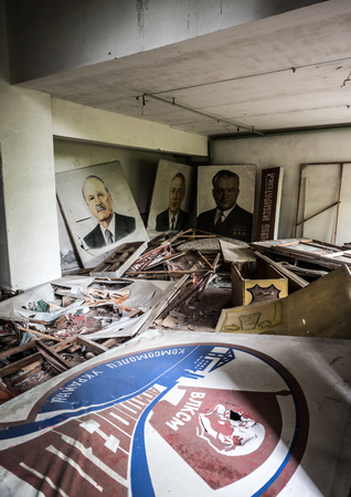 Pripyat, Ukraine - May 29, 2016: abandoned school room with pictures and debris on the floor in Pripyat, Chernobyl, Ukraineのeditorial素材