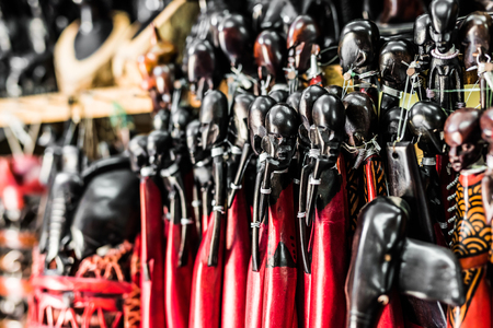 Masai, wooden african tribal figures at a market, Zanzibarの写真素材