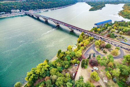 colorful aerial photo of Dnipro and bridge across it in Kyiv, Ukraine
