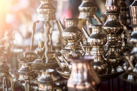 Brass utensils shop with handicrafts and souvenirs in Kathmandu market, Nepalの写真素材