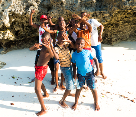 Zanzibar, Tanzania - July 09, 2016: Boys living on Zanzibar. wearing bright colorful clothesのeditorial素材