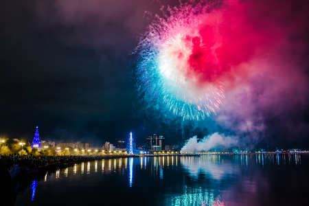 beautiful multicolored New Years fireworks on the embankment of Baku, Azerbaijanの写真素材