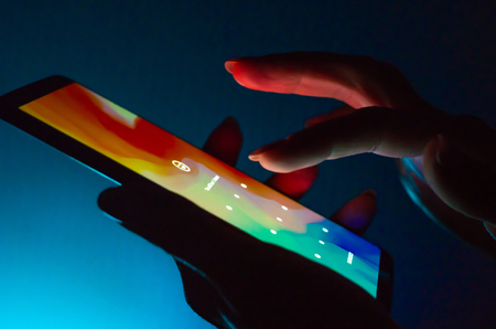 Kharkiv, Ukraine - 16 November 2018: close up smartphone unlock on the screen with a dark backgroundのeditorial素材